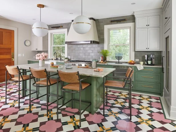 Colorful Kitchen With Green Cabinets and a Patterned Floor