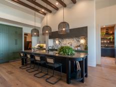 Team Jonathan Knight and Kristina Crestin's finished kitchen features ceiling beams and a long, rounded edges island, as seen on Rock the Block, Season 4. (After, Matches Kitchen Before 0006)