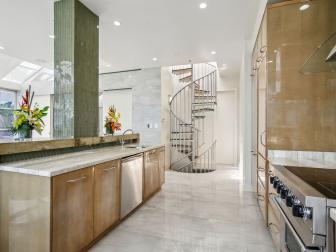 Sleek Kitchen With Spiral Staircase