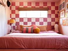 Eclectic Pink Contemporary Bedroom With Checkered Wallpaper and Gallery Wall 