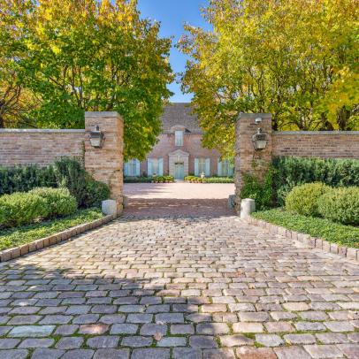 French Manor Home With Stone Driveway