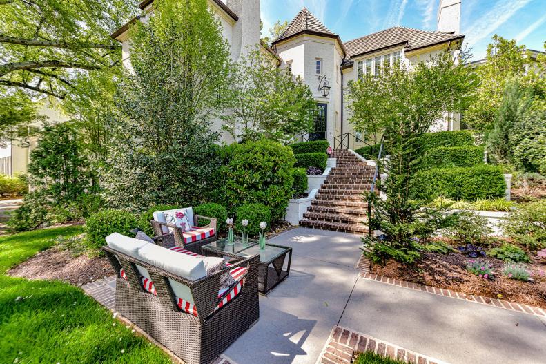 Front Yard With Red Cushions