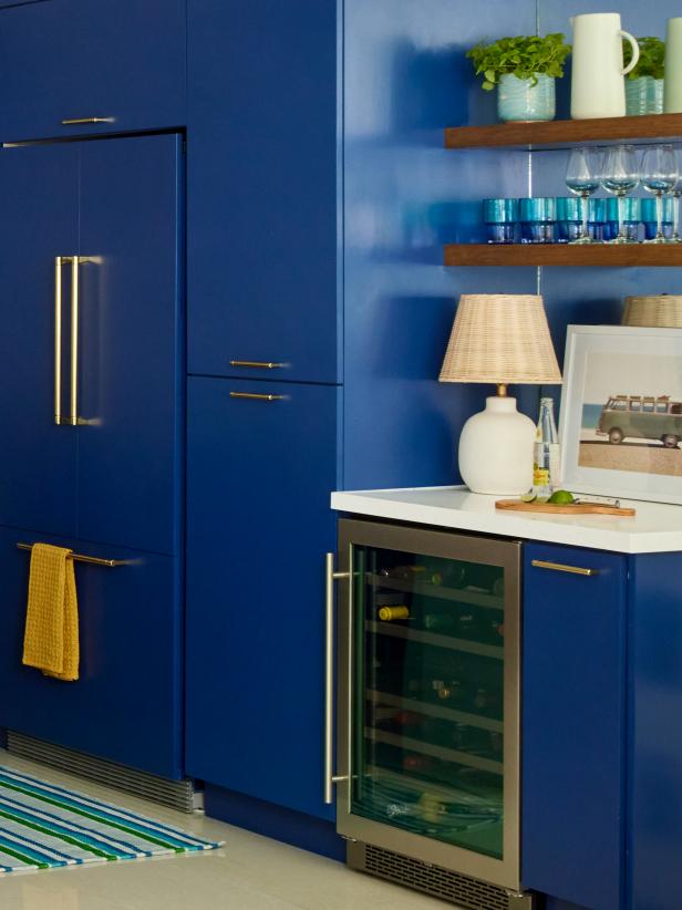 Kitchen Bar Area With Blue Cabinets and Fridge 