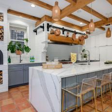 Updated Kitchen With Quartz Island, Wood Beams and Terracotta Floors