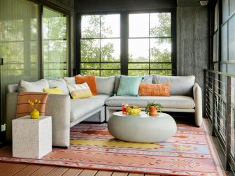 Porch With Black Walls and Midcentury Modern Decor