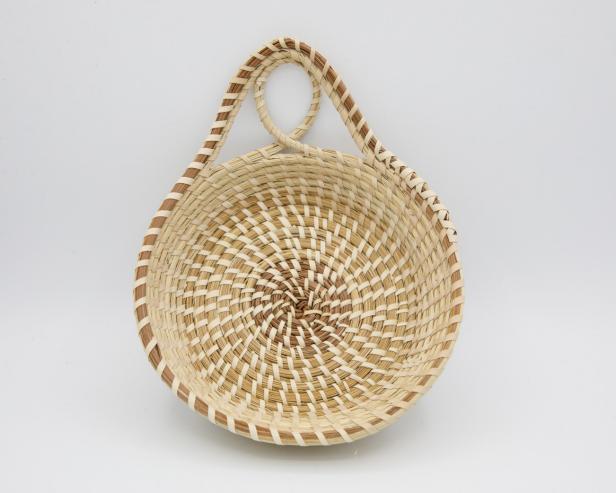 A handmade sweetgrass basket for snacks. 