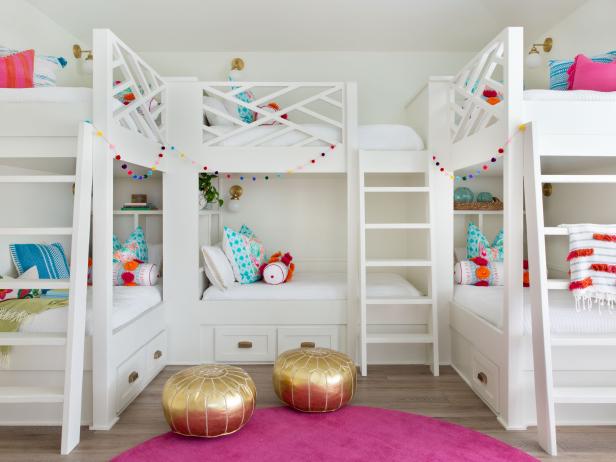 Multicolored Tropical Kids Room With Gold Ottomans