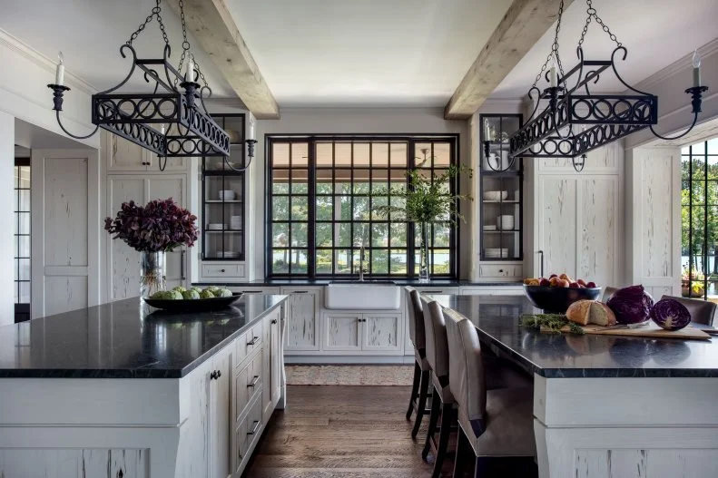 View Between Two Kitchen Islands of Farmhouse Sink