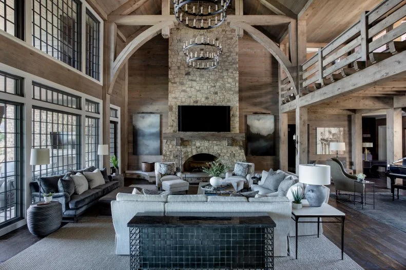 Two-Story Transitional Living Room With Stone Fireplace