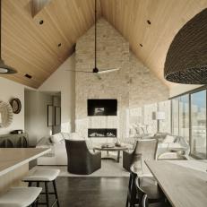 Neutral Modern Great Room With Limestone Fireplace