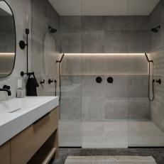 Gray Modern Bathroom With Black Towel