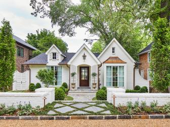 White Traditional Home With Three Gables