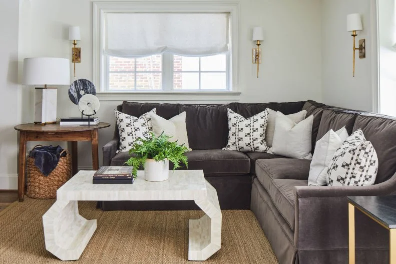 Brown Sectional Sofa and White Coffee Table in Sitting Room