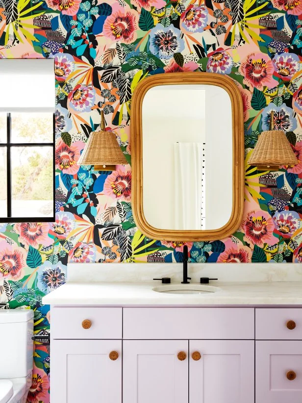 Multicolor Bathroom With Flowery Wallpaper and a Purple Vanity