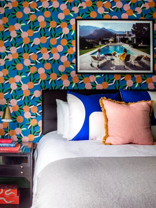 Bold Bedroom With Fruit-Print Wallpaper and Summer Art