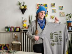 Woman Smiles to Camera Holding Block Print DIY Shirt