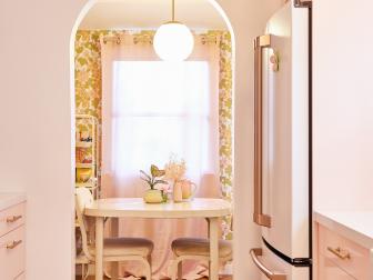 Retro Los Angeles Kitchen With Arched Doorway and Wallpapered Breakfast Nook 