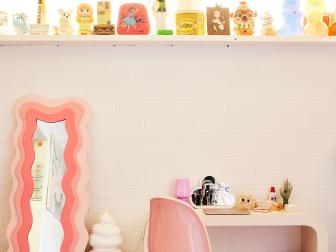 Eclectic Retro Office With Pink Wavy Floor Mirror and Panton Chair 
