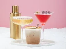 Three Winter Holiday Drinks With a Gold Cocktail Shaker