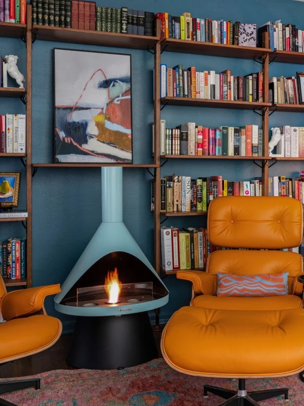 Blue Den With Bookshelves and a Gel Fireplace