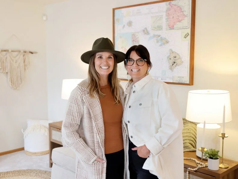 Leslie Davis and Lyndsay Lamb posing together on reveal day, as seen on Unsellable Houses, Season 5.