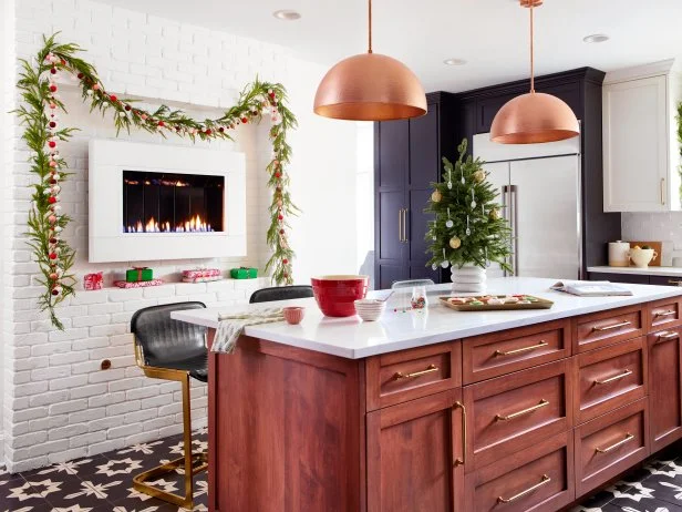 Black and White Kitchen With an Island, Fireplace and Holiday Decor