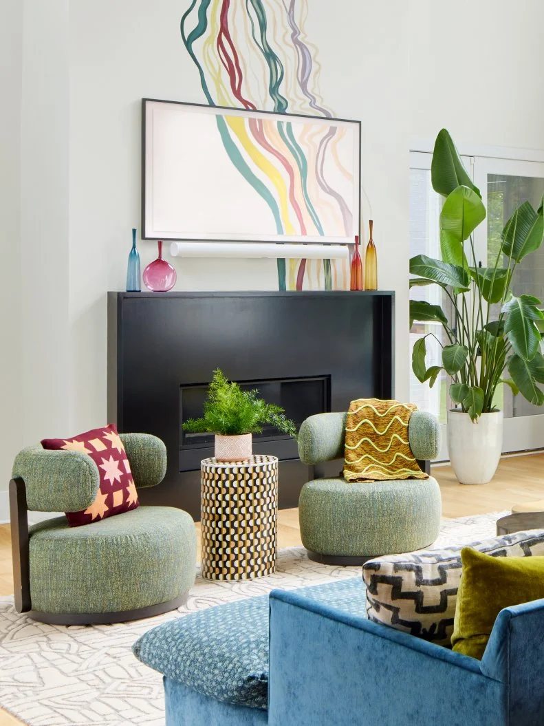 White Living Room With Colorful Art and Textiles