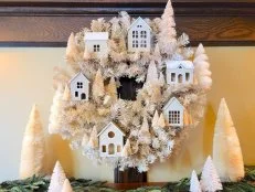 Beige Christmas Wreath With Mini Wooden Houses and Bottle Brush Trees