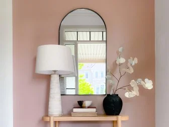 Relaxed, Boho-Style Hallway With Pale Pink Paint