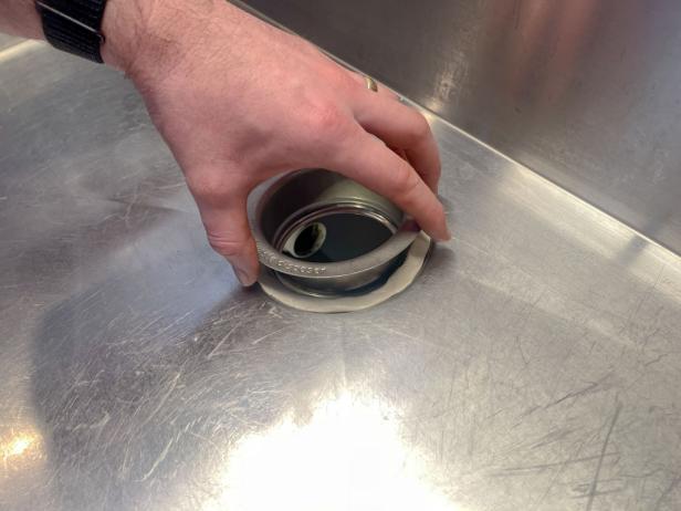 The next step in installing a garbage disposal is to install a garbage disposal drain flange.