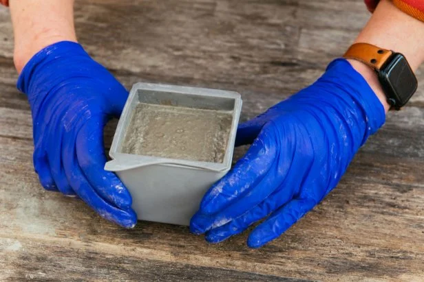 Tap the mold on the table, causing any air bubbles to rise to the surface.