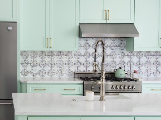 Vintage-Inspired Kitchen With Mint Cabinets, Patterned Tile and a Crystal Chandelier