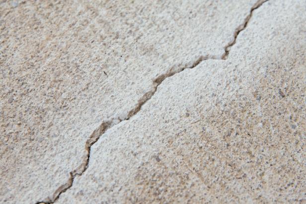 Crack in concrete should be free of debris before sealing.