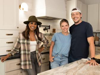 Mentor Taniya Nayak poses with her team of Sam and Sean Kilgore in their renovated kitchen, as seen on Battle on the Beach, Season 4.