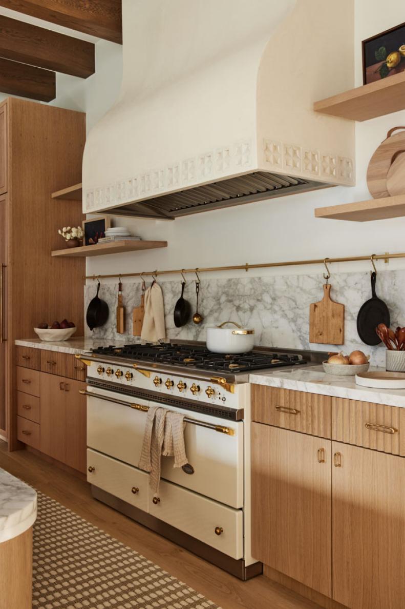 Italian-Inspired Kitchen With Large Range and Hood