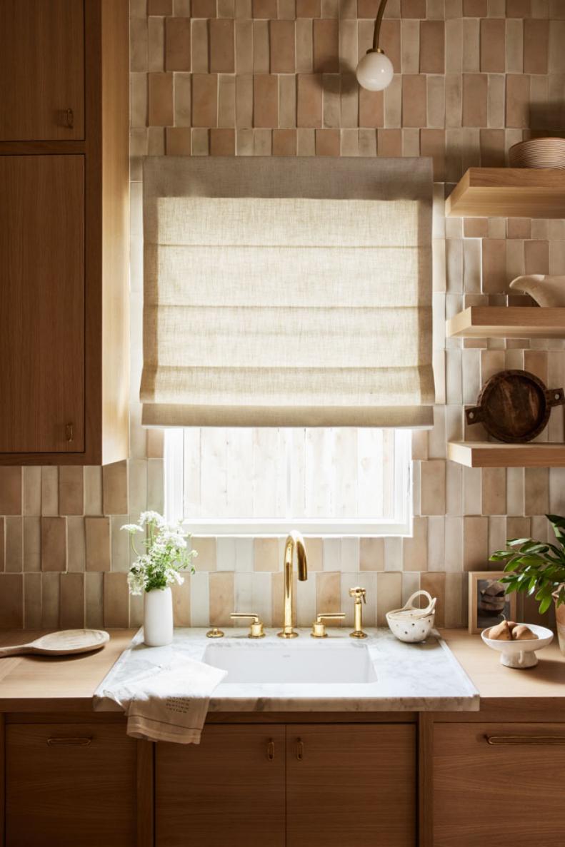 European-Style Kitchen With Handmade Tile Backsplash