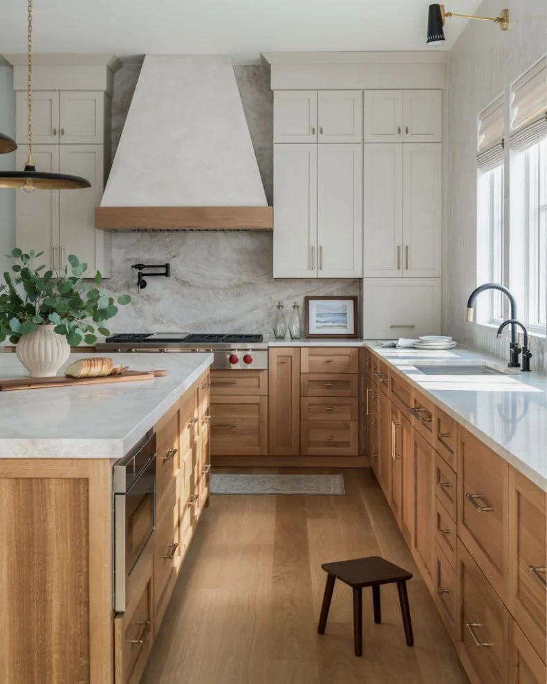 Warm Kitchen With Wood and Painted Cabinets