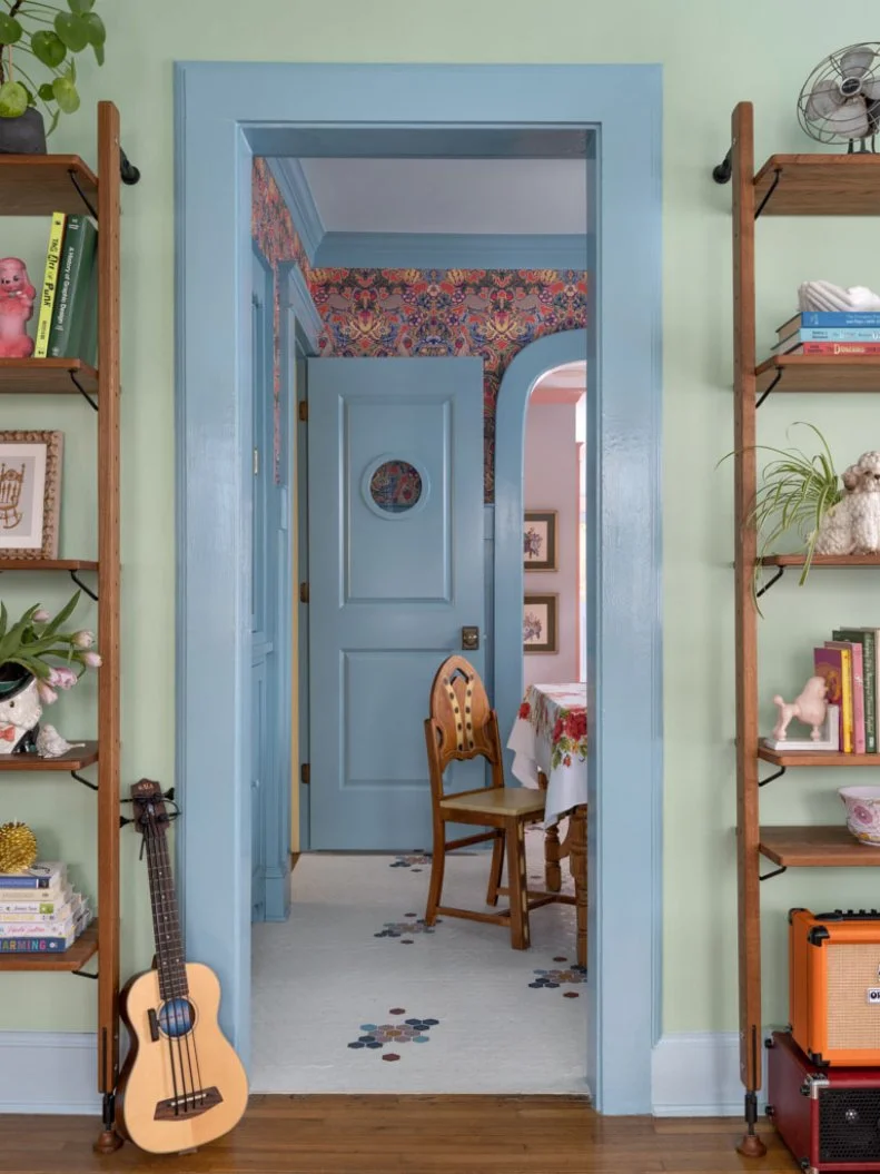Whimsical Dining Room With Blue Molding