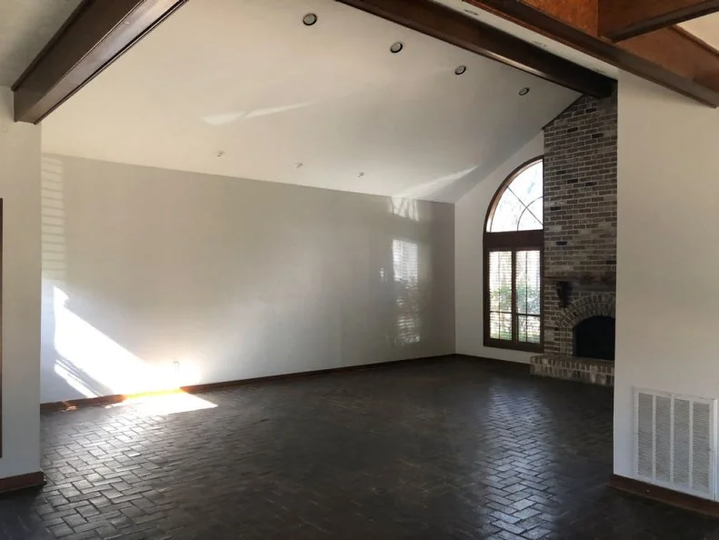 Before: Dark Living Room With Brick Floor