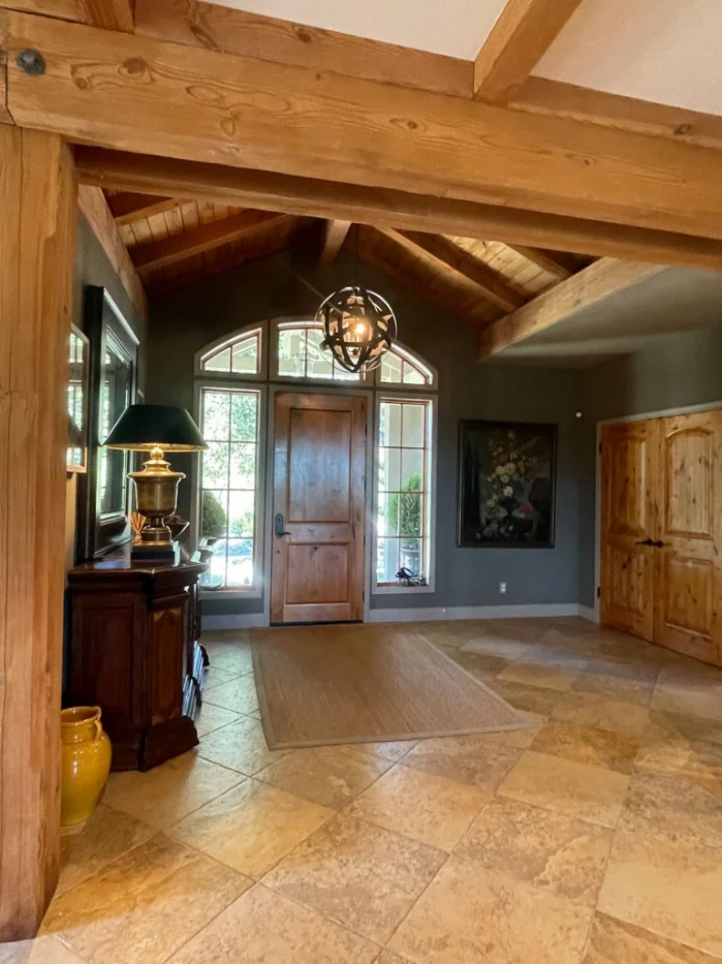 Before: Foyer With Bulky Furniture