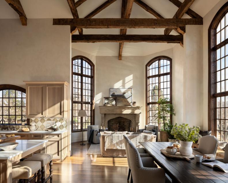 Large Open-Concept Dining Room With Exposed Beams