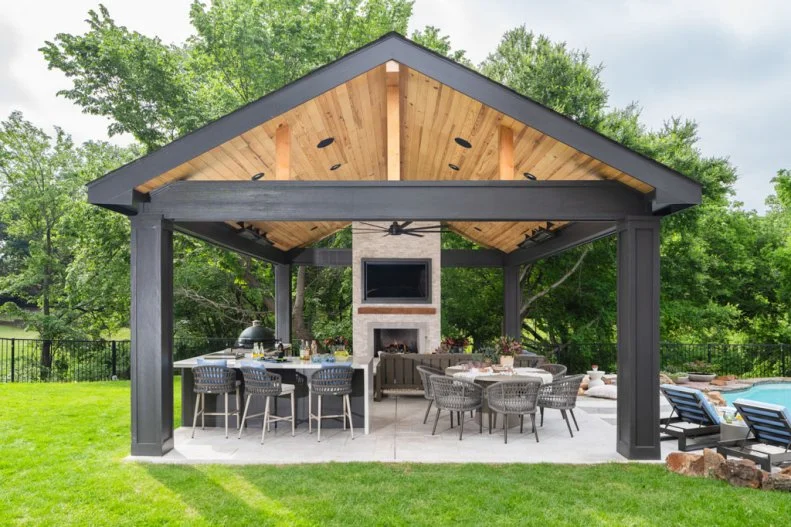 Covered Patio With Outdoor Kitchen and Dining Space