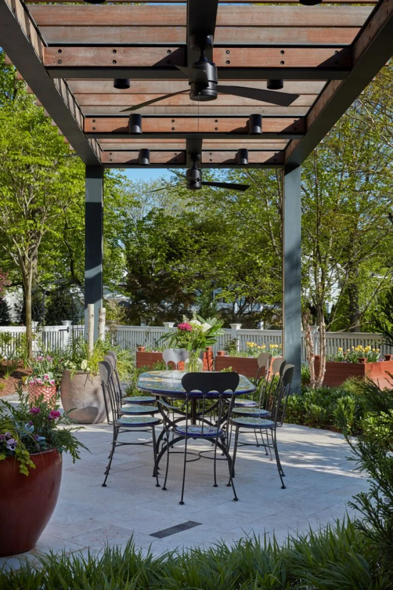 Backyard With Pergola and Dining Area