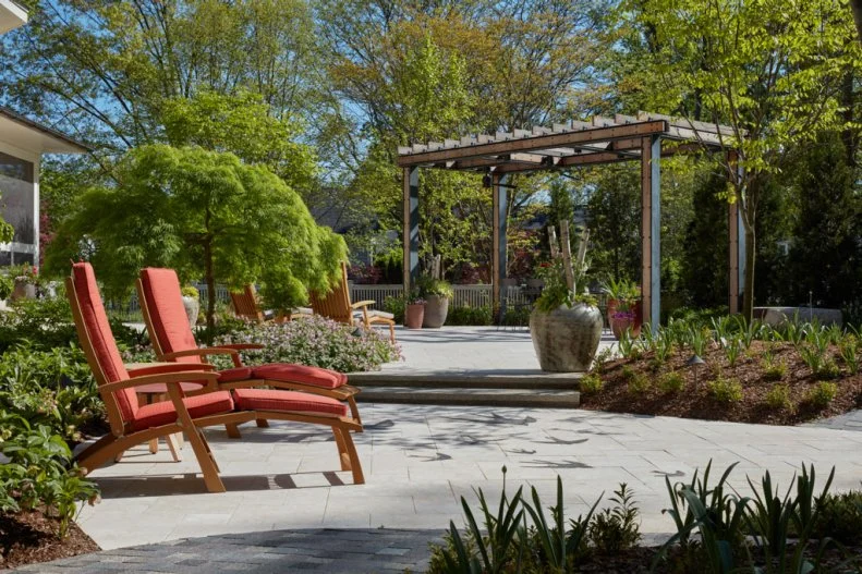 Backyard With Lounge Chairs and Pergola