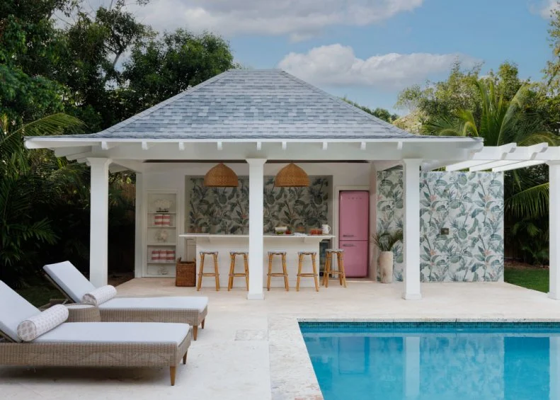 Pair of Pool Loungers Next to Custom-Built Cabana