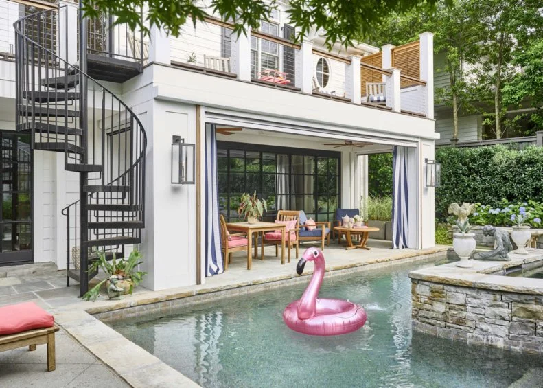 Inflatable Pink Flamingo Floating in Swimming Pool