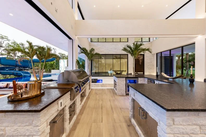 Black Countertops in Neutral Contemporary Outdoor Kitchen