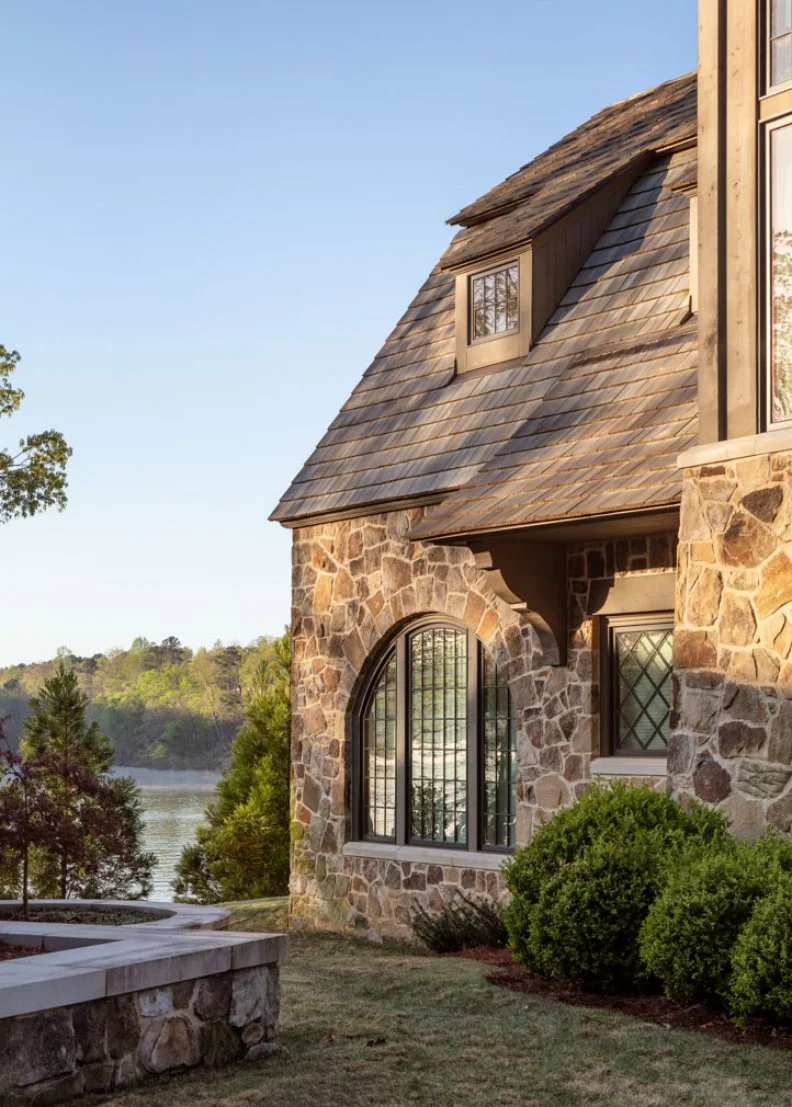 Waterfront Lake House With Stone Siding
