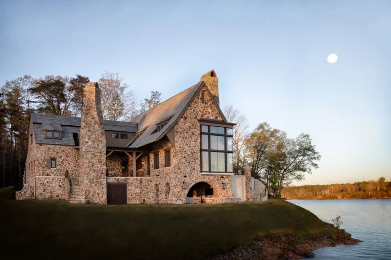 Lake House With Stone Siding and Modern Windows