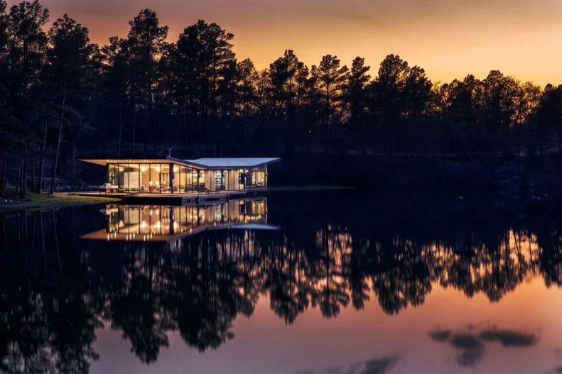 Contemporary House and Night Sky Reflected in Lake